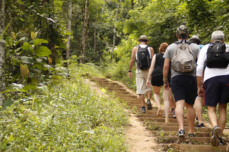 Experience a trek through the rainforest before arriving at the majestic Sono Beach