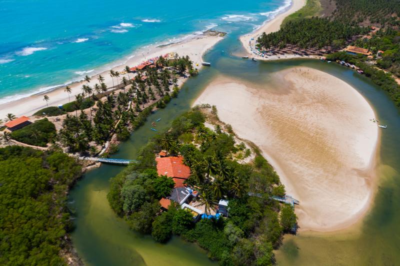 So much sand, green and crystal clear water