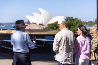 From Sydney Airport: 11:30 AM CBD Hotel Transfer with Lunch, The Rocks Walking Tour & Bondi Beach