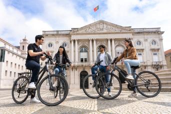 Visite de Lisbonne à 360° : vélo électrique, bateau et hélicoptère