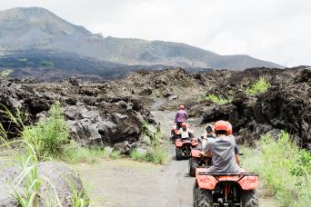 Quad Bike on Black Lava Sand and Natural Hot Sprin