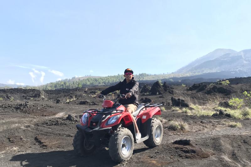 quad-bike-on-black-lava-sand-and-natural-hot-sprin-3