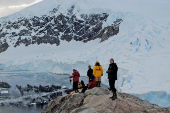 Land on the continent of Antarctica!