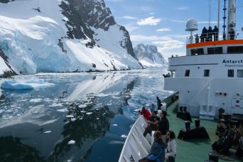 The ship Ushuaia cruising Antarctica's Lemaire Channel
