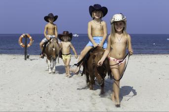 horse riding on the beach in Sardinia